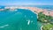 Aerial view of Venetian lagoon and cityscape of Venice island in sea from above, Italy