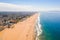 Aerial view of the Venice Beach coastline in Los Angeles on a bright day