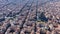 Aerial view video footage of residence districts in european city. Eixample district. Barcelona, Spain. Sagrada familia