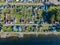 Aerial view of the village Iogach with gazebos and recreation center in the Altai Mountains on the shore of Lake Teletskoye with