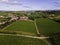 Aerial view of a vineyard with grape orchards in countryside at sunset, Ventosa, Lisbon, Portugal