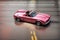 aerial view of vintage pink convertible car illustration generative ai