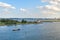 Aerial view of a vintage schooner ship heads towards the industrial section of the port of Warnemunde Rostock Germany