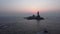 Aerial view of the Vivekananda Rock and Thiruvalluvar Statue while sunrise in Kanyakumari, Tamil nadu, India