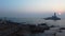 Aerial view of the Vivekananda Rock and Thiruvalluvar Statue while sunrise in Kanyakumari, Tamil nadu, India