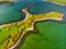 Aerial view of vivid emerald-green waters and islands near Westport town along the Wild Atlantic Way, County Mayo, Ireland