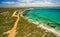 Aerial view of Vivonne Bay pier and vivid turquoise ocean water, Kangaroo Island, South Australia.