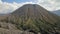 Aerial view of the volcanic cinder cone Mount Batok in the Mount Bromo national park, Java, Indonesia