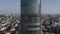 Aerial view of Vysotsky skyscraper in Ekaterinburg city in Russia. Stock footage. Flying towards the glass facade tall