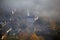 Aerial view of Waitsfield, VT in fog with church steeple on Scenic Route 100 in Autumn
