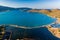 Aerial view of the walls of the sunken ancient Minoan city of Olous in Elounda, Crete, Greece