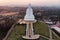 Aerial view of Wat Huay Pla Kang temple with Guanyin and church at sunset