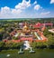 Aerial view of Wat Pikul Thong Phra Aram Luang or Wat Luang Por Pae temple with giant Buddha, in Sing Buri, Thailand