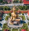 Aerial view of Wat Pikul Thong Phra Aram Luang or Wat Luang Por Pae temple with giant Buddha, in Sing Buri, Thailand