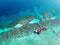 Aerial view of water chalet in Egang Egang near Bum Bum Island during sunrise