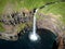 Aerial view of waterfall falling from the cliff into the sea, Denmark, Faroe Islands, Vagar Island, Gasadalur