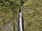 Aerial view of a waterfall in the Peruvian Andes.