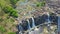 Aerial View Waterfalls from Steep High Cliffs