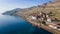 Aerial view of the waterfront Saint-Saphorin village with rural buildings in Lavaux, Switzerland