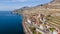 Aerial view of the waterfront Saint-Saphorin village with rural buildings in Lavaux, Switzerland
