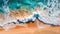 Aerial View of a Wave reaching a sandy Beach