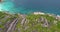 Aerial view waves break on  island beach at sunset. Sea waves on the beautiful island aerial view drone 4k