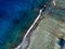 Aerial view of waves on reef of polynesia Cook islands