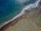 Aerial view of waves on reef of polynesia Cook islands