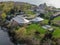 Aerial view of wedding reception ceremony setup with big white tents