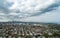 Aerial view of West Gate Bridge and Melbourne city on cloudy day