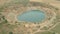 Aerial view of wheat fields and abandoned copper open pit mine