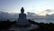 .aerial view white big Phuket Buddha in dark blue sky at twilight.