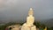 .aerial view white big Phuket Buddha in dark blue sky at twilight..