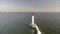 Aerial view of white lighthouse. Sea Port of Odessa. Ukraine. Black Sea.