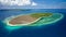 Aerial view on the whole small tropical island surrounded by coral reefs, Indonesia, Sulawesi.