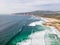 Aerial view of wild Portuguese coastline near Guincho beach and Cabo da Roca landmark, view of Atlantic Ocean rough sea crashing
