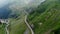 Aerial view winding mountain road in Romania, cloudy day