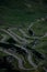 Aerial view of the winding Transfagarasan road on the green hillside