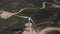 Aerial view of windmills against the sea, laid out on the mountain