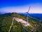 Aerial view of windmills in summer landscape in Croatia. Wind turbines for electric power