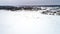 Aerial view of winter fishing. Fishermen set up tents for fishing at night.