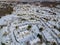 Aerial view winter landscape American town small home complex of a snowy winter on the streets after snowfall