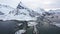 Aerial view of winter landscapes, snowcapped mountains and frozen road in Lofoten Islands in Norway