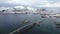 Aerial view of winter landscapes, snowcapped mountains and frozen road in Lofoten Islands in Norway