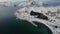 Aerial view of winter landscapes, snowcapped mountains and frozen road in Lofoten Islands in Norway