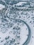 Aerial view winter of road in the forest covered with snow, Finland Lapland