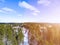 Aerial view of a winter road. Winter landscape countryside. Aerial photography of snow forest. Captured from above with a drone. A