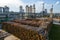 Aerial view of wood processing factory with stacks of lumber at plant manufacturing yard