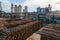 Aerial view of wood processing factory with stacks of lumber at plant manufacturing yard