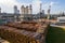 Aerial view of wood processing factory with stacks of lumber at plant manufacturing yard